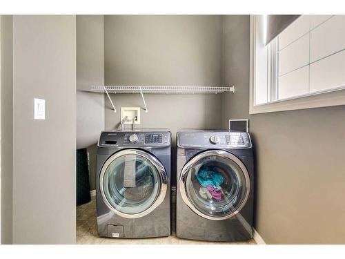 229 Cimarron Drive, Okotoks, AB - Indoor Photo Showing Laundry Room