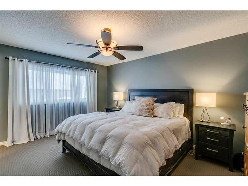 229 Cimarron Drive, Okotoks, AB - Indoor Photo Showing Bedroom