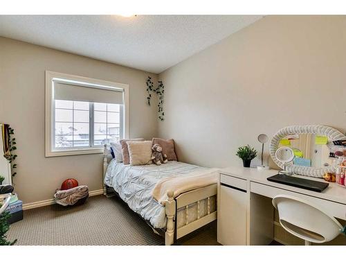 229 Cimarron Drive, Okotoks, AB - Indoor Photo Showing Bedroom