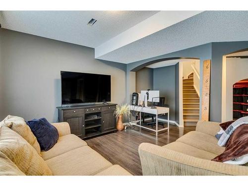 229 Cimarron Drive, Okotoks, AB - Indoor Photo Showing Living Room