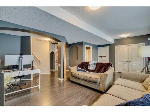 229 Cimarron Drive, Okotoks, AB - Indoor Photo Showing Living Room