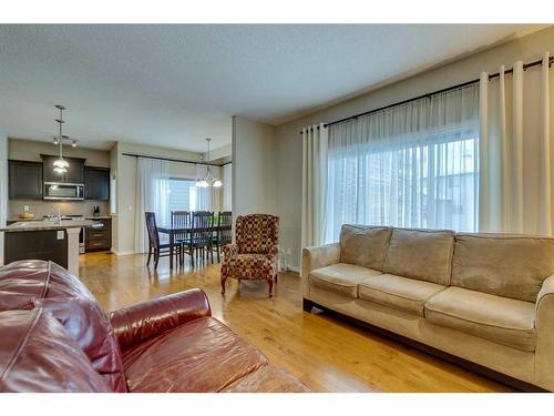 229 Cimarron Drive, Okotoks, AB - Indoor Photo Showing Living Room