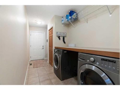 147-5417 Highway 579, Rural Mountain View County, AB - Indoor Photo Showing Laundry Room