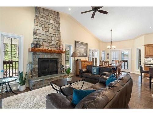 147-5417 Highway 579, Rural Mountain View County, AB - Indoor Photo Showing Living Room With Fireplace