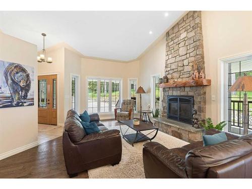 147-5417 Highway 579, Rural Mountain View County, AB - Indoor Photo Showing Living Room With Fireplace