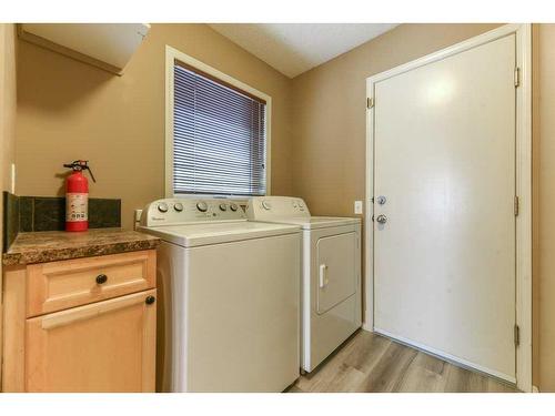 82 Tuscany Ravine Road Nw, Calgary, AB - Indoor Photo Showing Laundry Room