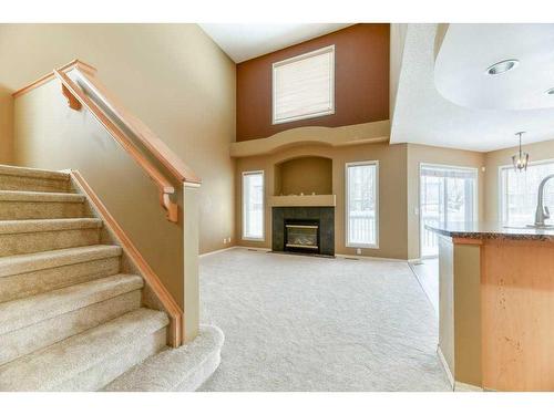 82 Tuscany Ravine Road Nw, Calgary, AB - Indoor With Fireplace