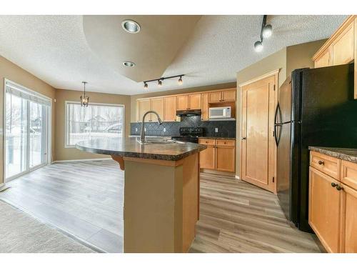 82 Tuscany Ravine Road Nw, Calgary, AB - Indoor Photo Showing Kitchen