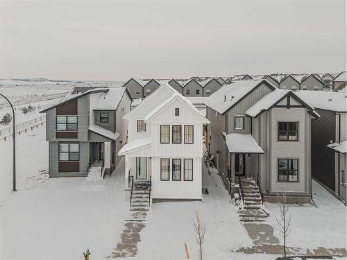 565 Southpoint Place Sw, Airdrie, AB - Outdoor With Facade