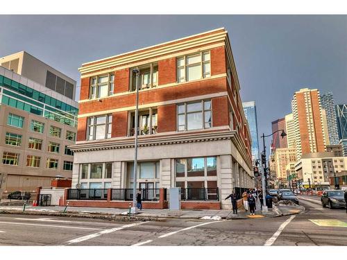 109-1117 1 Street Sw, Calgary, AB - Outdoor With Facade