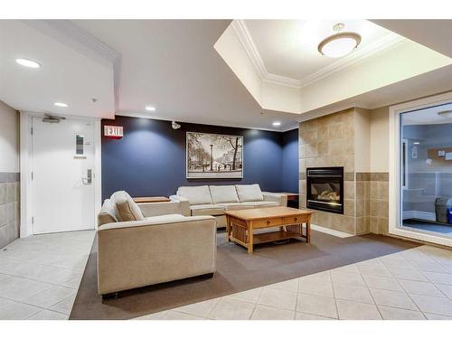 104-1315 12 Avenue Sw, Calgary, AB - Indoor With Fireplace