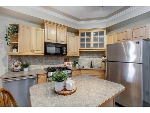 104-1315 12 Avenue Sw, Calgary, AB - Indoor Photo Showing Kitchen With Stainless Steel Kitchen With Double Sink