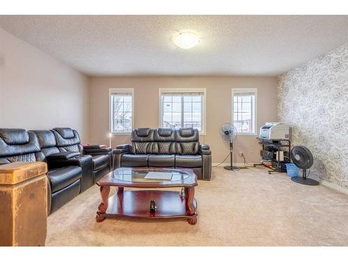 23 Taralake Lane Ne, Calgary, AB - Indoor Photo Showing Living Room