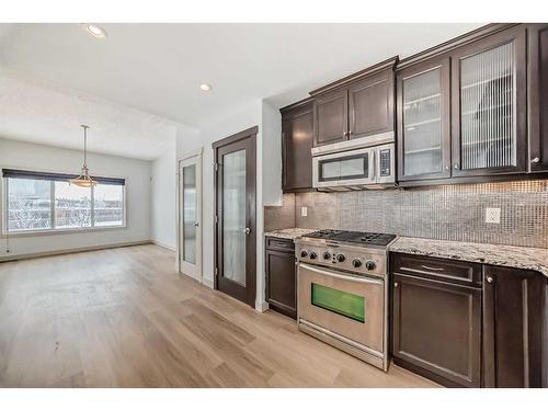 311 Mahogany Court Se, Calgary, AB - Indoor Photo Showing Kitchen With Upgraded Kitchen