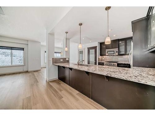 311 Mahogany Court Se, Calgary, AB - Indoor Photo Showing Kitchen With Upgraded Kitchen