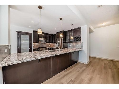 311 Mahogany Court Se, Calgary, AB - Indoor Photo Showing Kitchen With Upgraded Kitchen