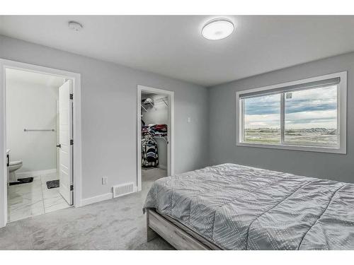 114 Waterford Road, Chestermere, AB - Indoor Photo Showing Bedroom