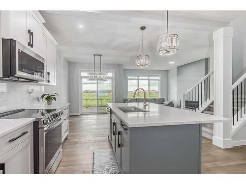 114 Waterford Road, Chestermere, AB - Indoor Photo Showing Kitchen With Upgraded Kitchen