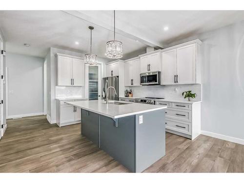 114 Waterford Road, Chestermere, AB - Indoor Photo Showing Kitchen With Upgraded Kitchen