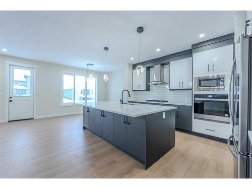 22 North Bridges Landing, Langdon, AB - Indoor Photo Showing Kitchen With Upgraded Kitchen