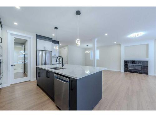 22 North Bridges Landing, Langdon, AB - Indoor Photo Showing Kitchen With Double Sink With Upgraded Kitchen