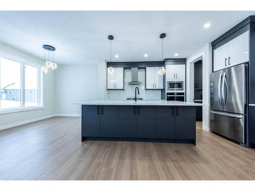 22 North Bridges Landing, Langdon, AB - Indoor Photo Showing Kitchen With Upgraded Kitchen