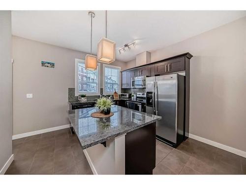 307 Evanston Square Nw, Calgary, AB - Indoor Photo Showing Kitchen With Stainless Steel Kitchen