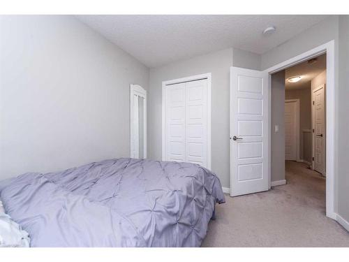 257 Cornerstone Passage Ne, Calgary, AB - Indoor Photo Showing Bedroom