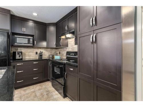 108 Chaparral Valley Gardens Se, Calgary, AB - Indoor Photo Showing Kitchen With Upgraded Kitchen