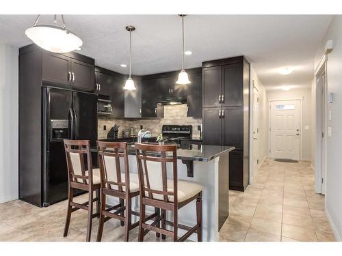 108 Chaparral Valley Gardens Se, Calgary, AB - Indoor Photo Showing Kitchen With Upgraded Kitchen