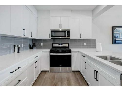 141 Crestridge Common Sw, Calgary, AB - Indoor Photo Showing Kitchen