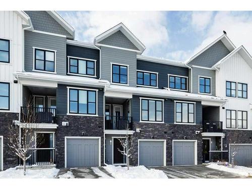 141 Crestridge Common Sw, Calgary, AB - Outdoor With Facade