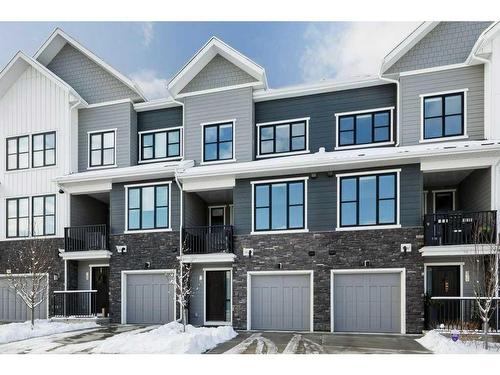 141 Crestridge Common Sw, Calgary, AB - Outdoor With Facade