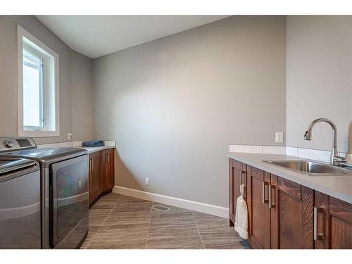 262107 Range Road 11, Balzac, AB - Indoor Photo Showing Laundry Room