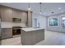 1318-111 Wolf Creek Drive Se, Calgary, AB  - Indoor Photo Showing Kitchen With Stainless Steel Kitchen With Upgraded Kitchen 