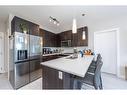 202-24 Sage Hill Terrace Nw, Calgary, AB  - Indoor Photo Showing Kitchen With Double Sink With Upgraded Kitchen 