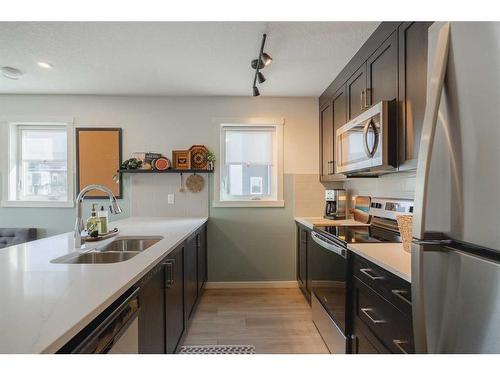 424 Seton Circle Se, Calgary, AB - Indoor Photo Showing Kitchen With Double Sink