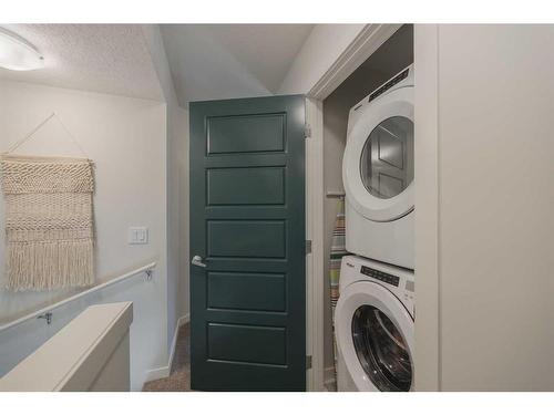 424 Seton Circle Se, Calgary, AB - Indoor Photo Showing Laundry Room