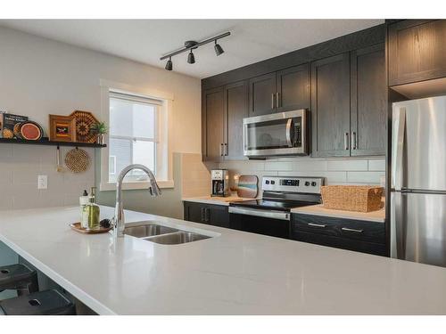 424 Seton Circle Se, Calgary, AB - Indoor Photo Showing Kitchen With Double Sink With Upgraded Kitchen