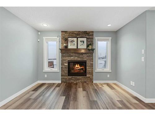 868 Lakewood Circle, Strathmore, AB - Indoor Photo Showing Living Room With Fireplace