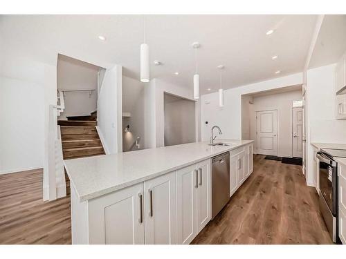 369 Magnolia Way Se, Calgary, AB - Indoor Photo Showing Kitchen With Upgraded Kitchen