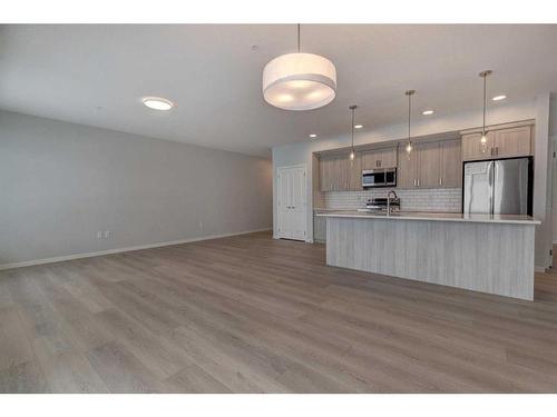 3113-550 Belmont Street Sw, Calgary, AB - Indoor Photo Showing Kitchen With Upgraded Kitchen