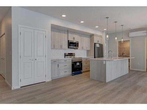 3113-550 Belmont Street Sw, Calgary, AB - Indoor Photo Showing Kitchen With Upgraded Kitchen