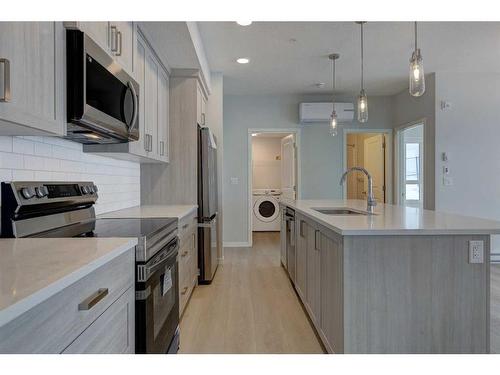 3113-550 Belmont Street Sw, Calgary, AB - Indoor Photo Showing Kitchen With Upgraded Kitchen