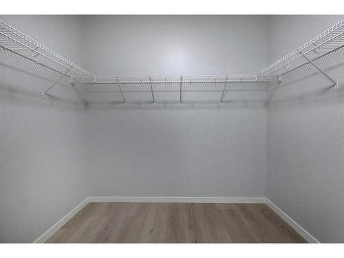 3113-550 Belmont Street Sw, Calgary, AB - Indoor With Storage