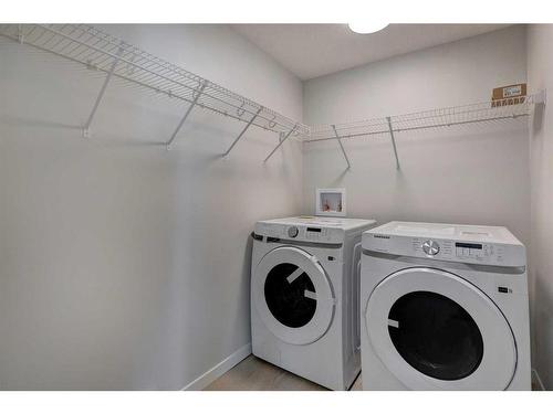 3113-550 Belmont Street Sw, Calgary, AB - Indoor Photo Showing Laundry Room