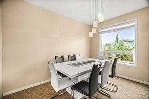 152 Silverado Plain Close Sw, Calgary, AB - Indoor Photo Showing Dining Room