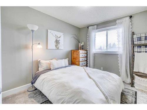 153 Arbour Wood Mews Nw, Calgary, AB - Indoor Photo Showing Bedroom