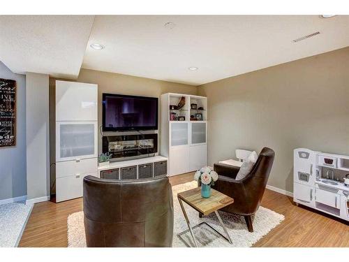 153 Arbour Wood Mews Nw, Calgary, AB - Indoor Photo Showing Living Room