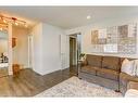 153 Arbour Wood Mews Nw, Calgary, AB  - Indoor Photo Showing Living Room 